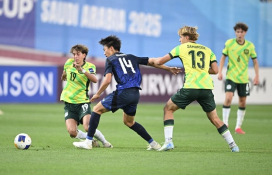 일본(파란색 유니폼)-호주 경기. /사진=아시아축구연맹 홈페이지 캡처
