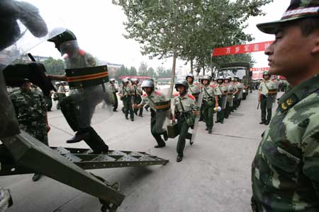 ↑베이징의 무장한 경관들이 훈련을 받고 있다. ⓒ국제올림픽조직위원회 제공