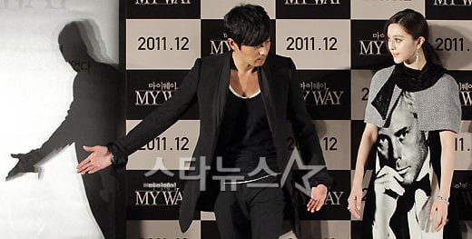 배우 장동건이 8일 오후 부산 해운대 센텀시티 CGV에서 열린 영화 '마이웨이' 제작보고회에서 판빙빙을 에스코트하고 있다. 이기범 기자