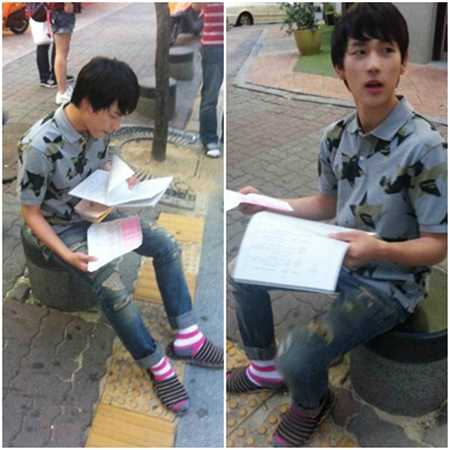 ZE:A’s Lim Si Wan reads script in the street