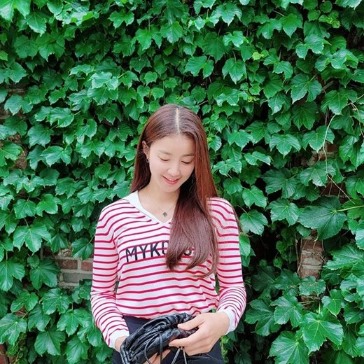 李诗英以可爱的笑容引以为豪的娃娃美