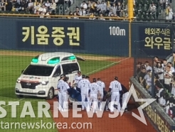 'LG 어쩌나' 5월 타율 0.364 홍창기, 수비 도중 충돌→무릎 잡고 쓰러졌다... 구급차 타고 그라운드 이탈 [잠실 현장]