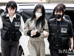 '손흥민 협박' 전 여친, 포승줄 묶인 채 등장... "초음파 조작인가" 질문에 묵묵부답