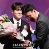 [포토] 김택연 '감독님 대신 아빠미소'