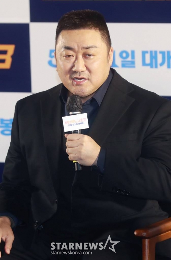 배우 마동석이 9일 오전 서울 강남구 메가박스 코엑스에서 진행된 영화 '범죄도시3'(감독 이상용) 제작발표회에 참석해 질문에 답하고 있다. 대체불가 괴물형사 마석도(마동석)가 서울 광수대로 이동 후, 신종 마약 범죄 사건의 배후인 주성철(이준혁)과 마약 사건에 연루된 또 다른 빌런 리키(아오키 무네타카)를 잡기 위해 펼치는 통쾌한 범죄 소탕 작전을 그린 영화 '범죄도시3'는 오는 31일 개봉한다. /2023.05.09 /사진=이동훈 기자 photoguy@