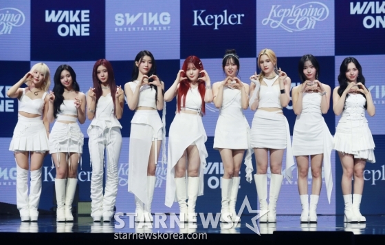 걸그룹 케플러가 3일 오후 서울 광진구 예스24라이브홀에서 진행된 첫 정규앨범 '켑원고잉 온'(Kep1going On) 발매기념 쇼케이스에서 포즈를 취하고 있다. 9인 완전체로 활동하는 마지막 음반 '켑원고잉 온'은 타이틀곡 '슈팅 스타'(Shooting Star)를 비롯해 '라스트 카니발' 등 총 10곡이 수록됐다. /2024.06.03 /사진=이동훈
