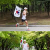 션, 광복절 81.5km 마라톤 완주 성공..10억 기부금 전달