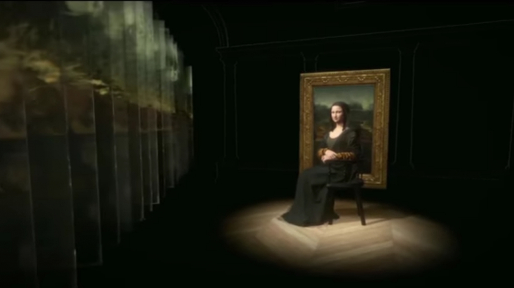 VR 전시회, 모나리자: 유리 너머로(Mona Lisa: Beyond the Glass), Louvre, Paris, 2019. 사진제공= Tech World, YouTube: HTC recreates Mona Lis in 3D, via Wikimedia Commons.