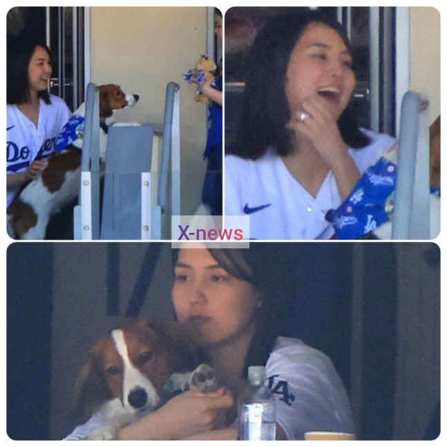 오타니의 아내 다나카 마미코가 30일(한국시간) 부부의 애완견 데코핀과 함께 미국 로스앤젤레스에 위치한 LA 다저스타디움의 스위트룸 발코니에서 남편 오타니의 경기를 관람 중이다. /사진=X(구 트위터) 갈무리