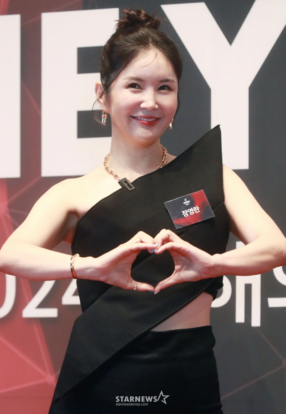 방송인 장영란이 3일 오후 서울 신라호텔에서 진행된 '2024 올해의 브랜드 대상' 포토월 행사에 참석해 포즈를 취하고 있다. /2024.09.03 /사진=이동훈