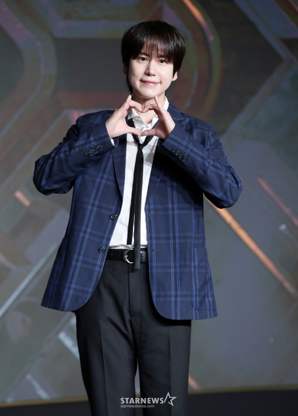그룹 슈퍼주니어 규현이 29일 오전 서울 마포구 호텔나루에서 열린 넷플릭스 '데블스 플랜: 데스룸' 제작발표회에 참석해 포즈를 취하고 있다. 정종연 PD가 연출하는 '데블스 플랜: 데스룸'은 다양한 직업군의 플레이어가 7일간 합숙하며 최고의 브레인을 가리는 두뇌 서바이벌 게임으로 오는 5월 6일 공개된다. /2025.04.29 /사진=김휘선 hwijpg@