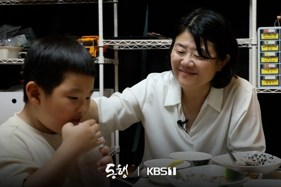 /사진='동행'